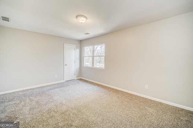 view of carpeted spare room