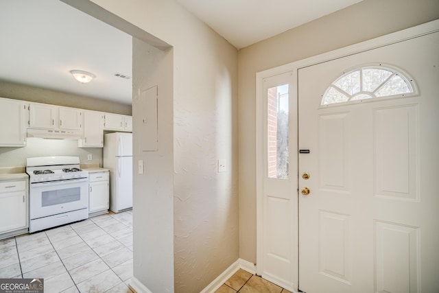 entrance foyer with light tile patterned flooring