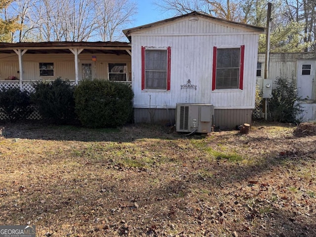 view of home's exterior with central AC unit