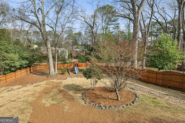 view of yard featuring a playground