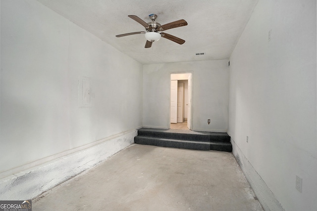 unfurnished room featuring ceiling fan