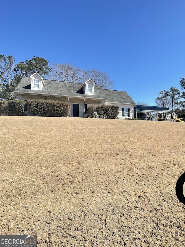 view of home's exterior featuring a lawn