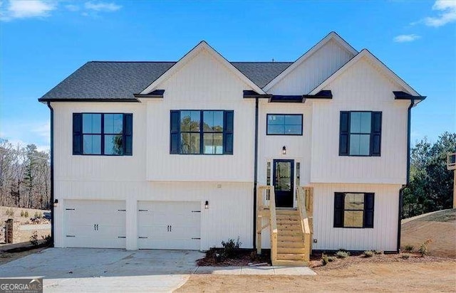 view of front of property with a garage