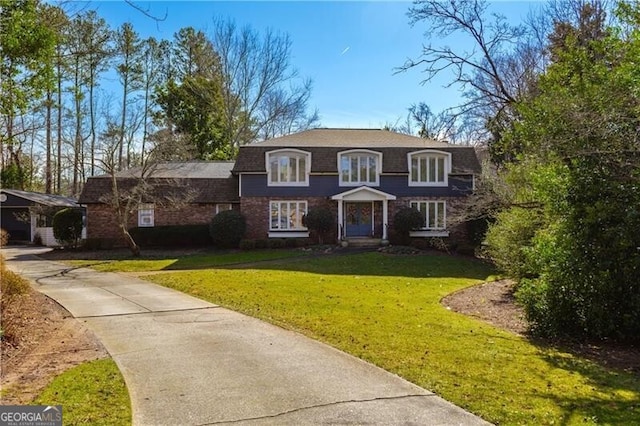 view of property with a front lawn