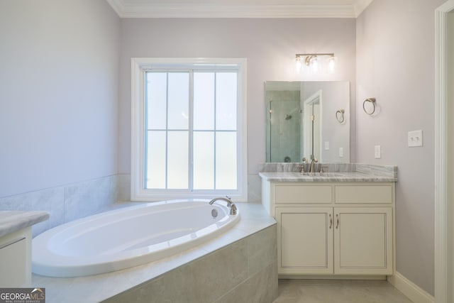 bathroom featuring vanity, crown molding, plus walk in shower, and a healthy amount of sunlight