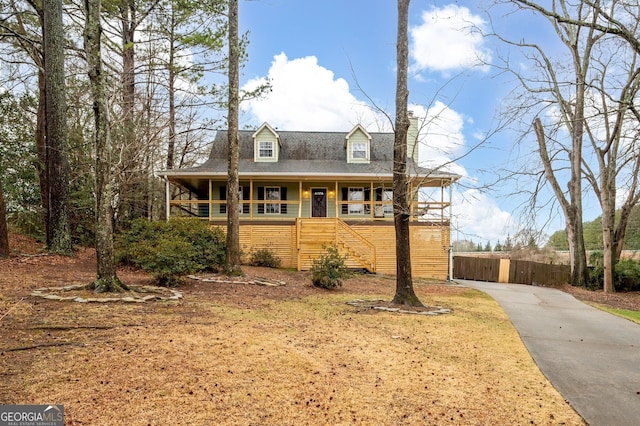 cape cod home with covered porch