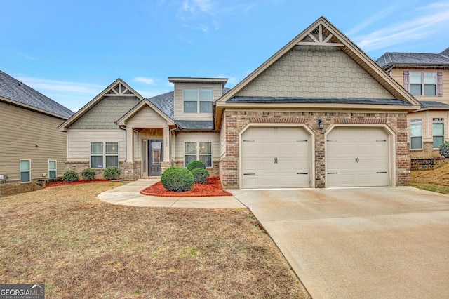 craftsman-style home with a garage and a front yard