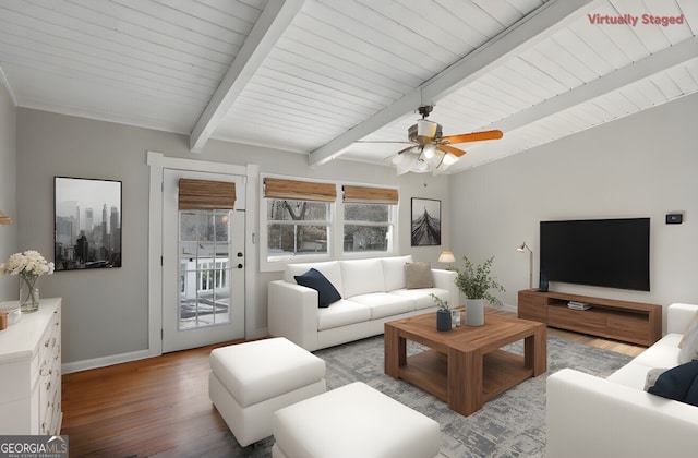 living room with beam ceiling, plenty of natural light, light hardwood / wood-style floors, and ceiling fan