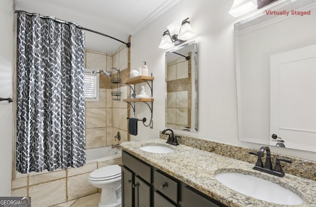 full bathroom with crown molding, toilet, vanity, and shower / bath combo with shower curtain