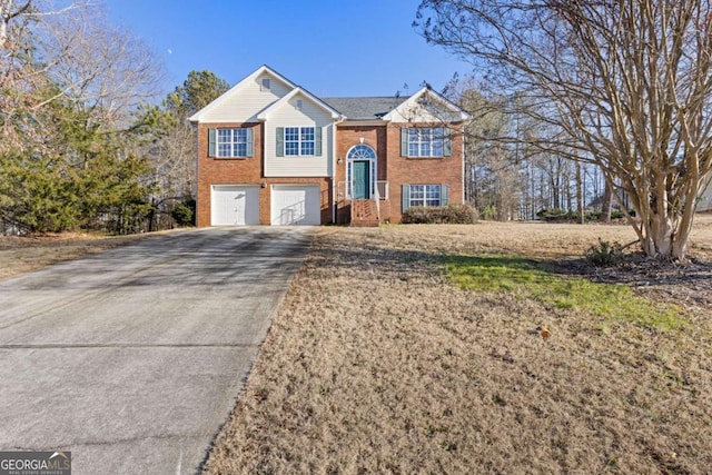 raised ranch featuring a garage