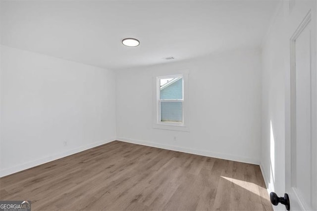 empty room featuring light wood-type flooring