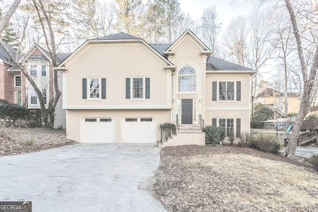 view of front of property with a garage