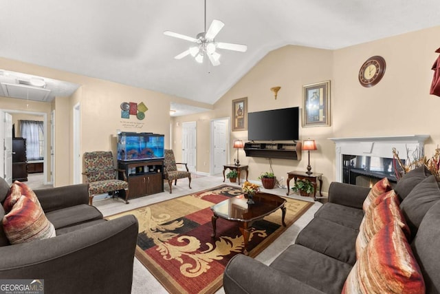 living room with light colored carpet, ceiling fan, lofted ceiling, and a high end fireplace