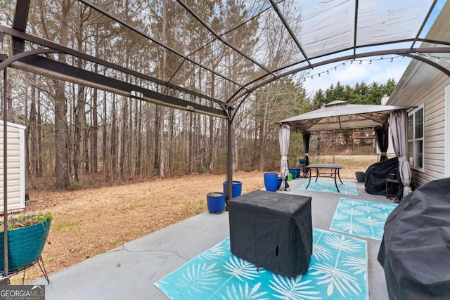 view of patio / terrace featuring area for grilling and a gazebo