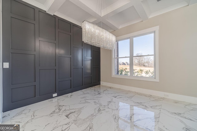 unfurnished bedroom with marble finish floor, coffered ceiling, a decorative wall, and baseboards