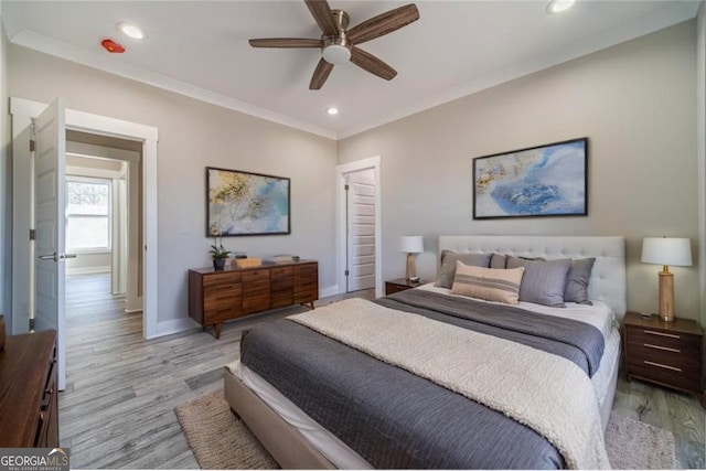 1785 Traditions Way, Jefferson, GA 30549 - bedroom with light wood-style flooring, recessed lighting, baseboards, crown molding, and ceiling fan