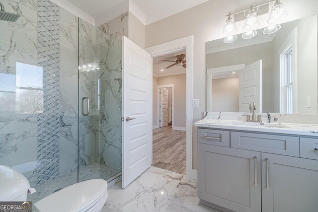 unfurnished bedroom featuring ornamental molding, connected bathroom, ceiling fan, and light hardwood / wood-style flooring