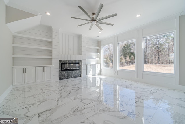 1785 Traditions Way, Jefferson, GA 30549 - unfurnished living room with marble tiled floors, a fireplace, a ceiling fan, recessed lighting, and built in features
