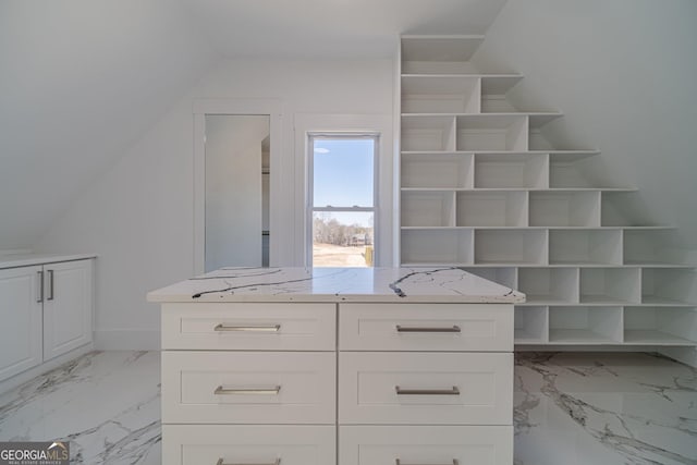 spacious closet featuring lofted ceiling