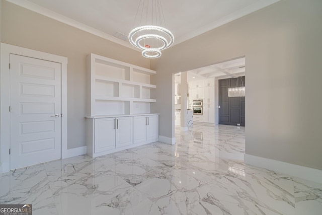 1785 Traditions Way, Jefferson, GA 30549 - unfurnished dining area with a chandelier, crown molding, baseboards, and light marble finish flooring