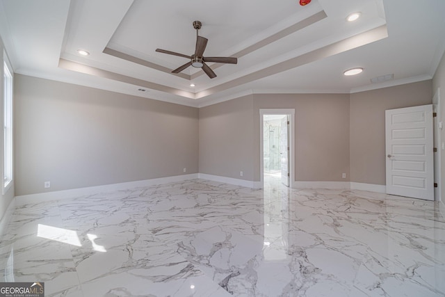 1785 Traditions Way, Jefferson, GA 30549 - unfurnished room with a tray ceiling, ceiling fan, baseboards, recessed lighting, and crown molding