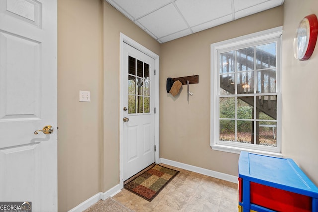 doorway featuring a paneled ceiling