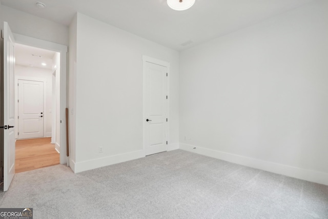 view of carpeted spare room