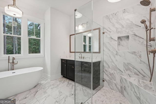 bathroom featuring vanity and separate shower and tub