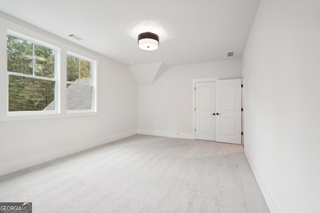 interior space featuring vaulted ceiling