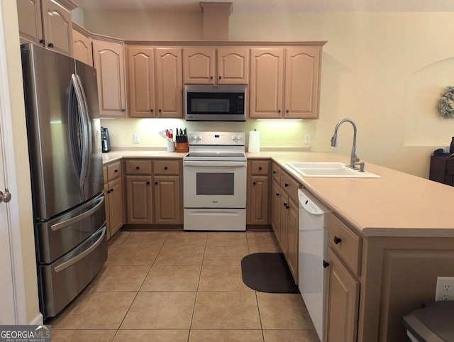 kitchen featuring sink, appliances with stainless steel finishes, light tile patterned flooring, kitchen peninsula, and light brown cabinets