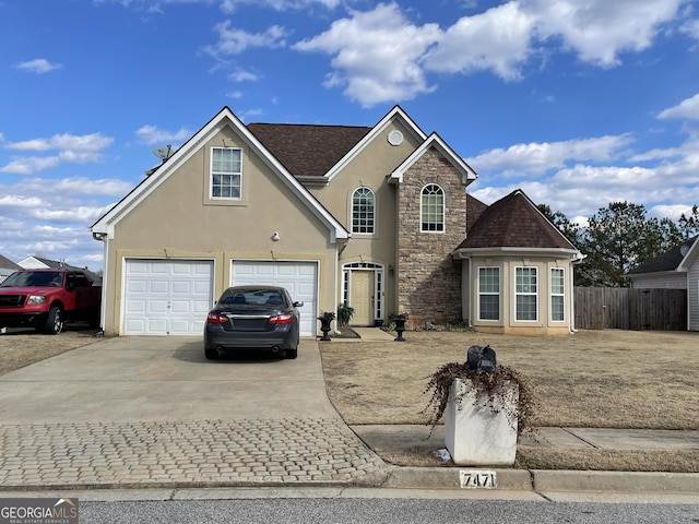 front of property with a garage