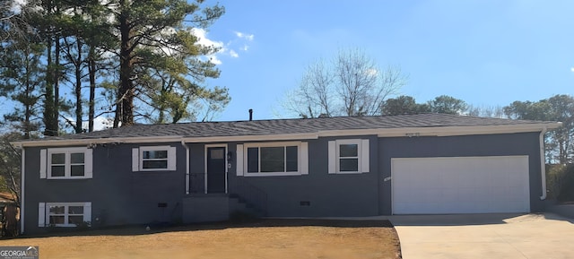 ranch-style house with a garage