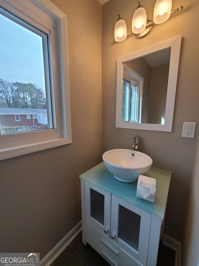 bathroom featuring tile patterned floors and vanity