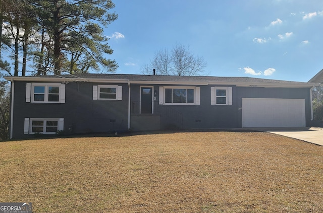 single story home featuring a garage and a front yard