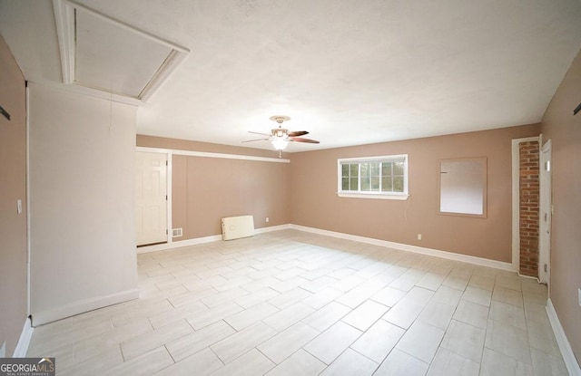 unfurnished room featuring ceiling fan