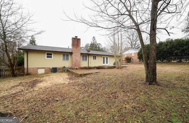 back of house featuring central AC and a patio