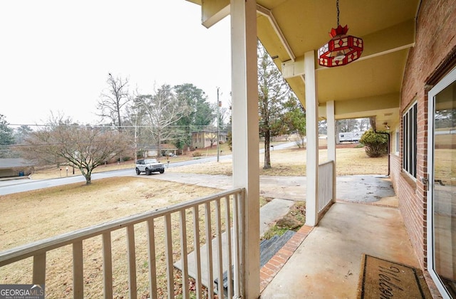 view of patio featuring a porch