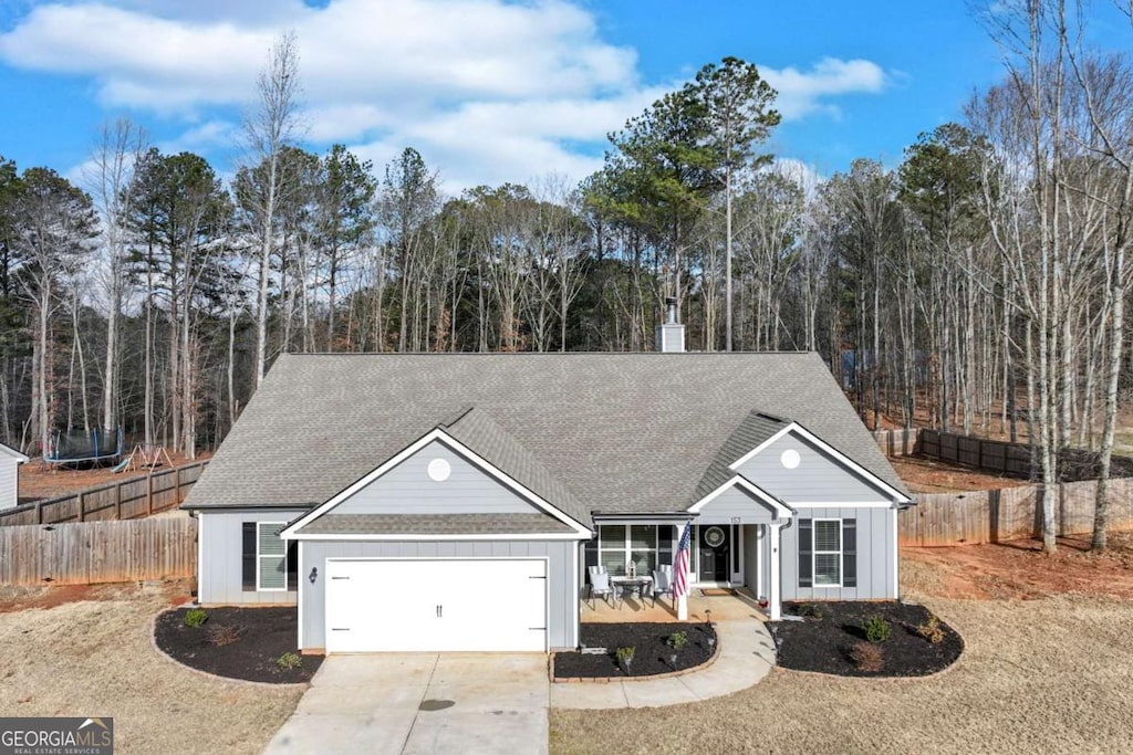 153 Abby Ln, Statham, GA 30666 - view of front of house featuring a garage