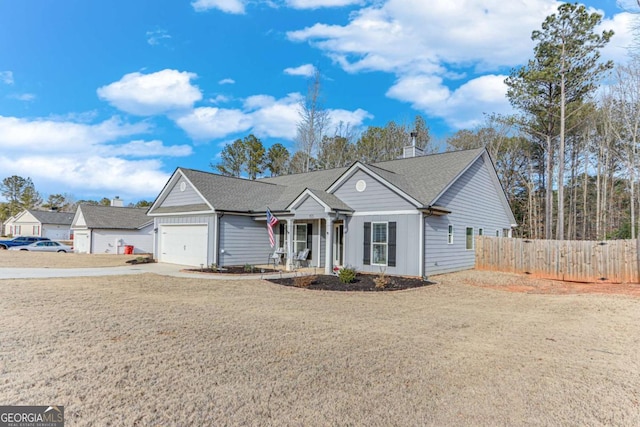 ranch-style home with a garage and a front lawn