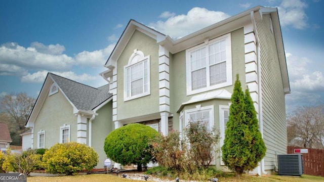 view of home's exterior with central air condition unit