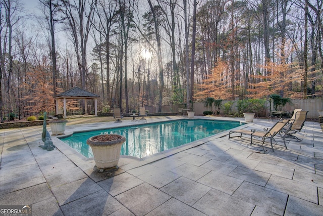 view of pool featuring a gazebo and a patio area