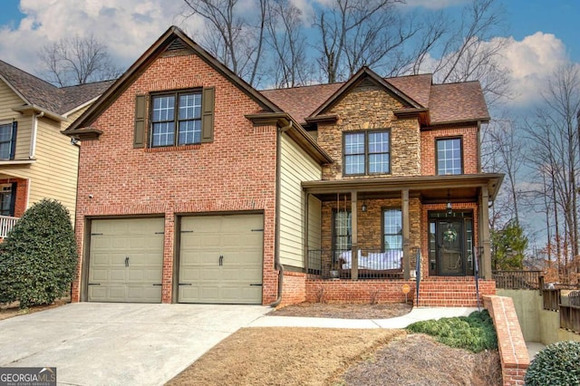 view of front of house with a garage and a porch