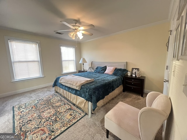 carpeted bedroom featuring ornamental molding and ceiling fan