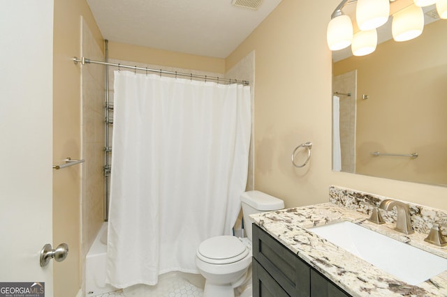 full bathroom with vanity, toilet, and shower / bath combo with shower curtain