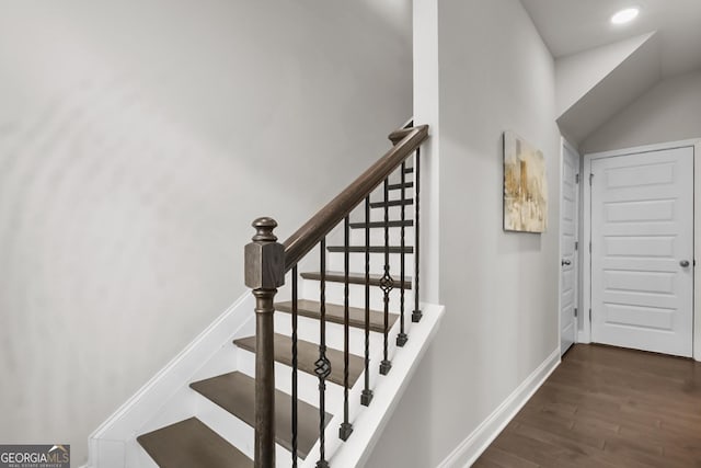 stairway with wood-type flooring