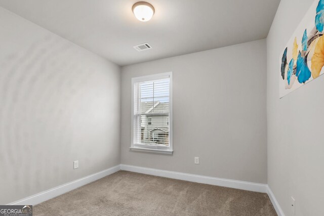 view of carpeted spare room