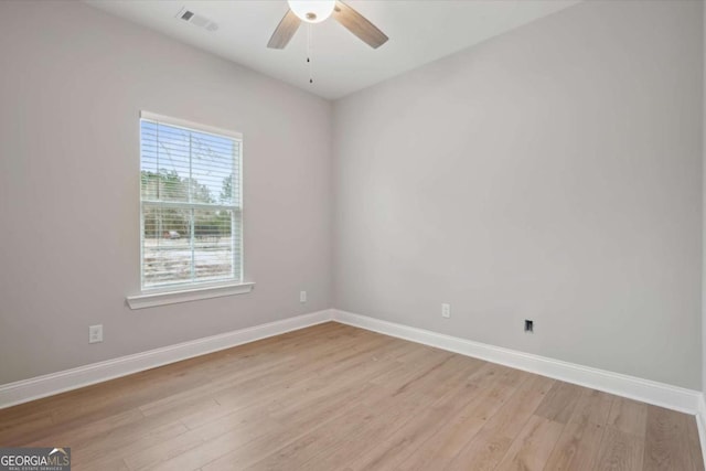 unfurnished room featuring ceiling fan and light hardwood / wood-style floors