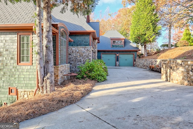 view of front of property with a garage