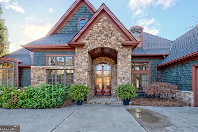 doorway to property featuring french doors