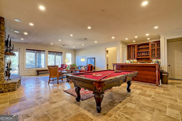 game room featuring crown molding, pool table, and indoor bar